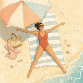 woman lying on the beach enjoying the sun